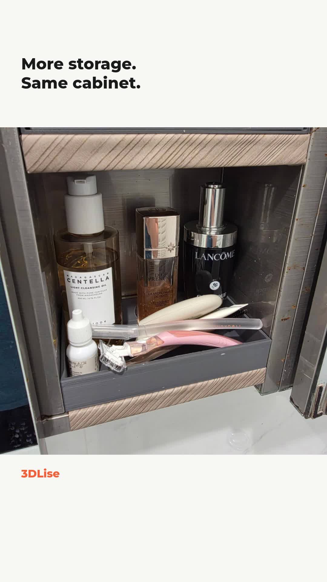 A grey raised-edge insert inside a bathroom cabinet